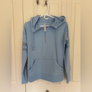 Lorna Jane blue active hoodie size XS. Pockets. Mesh on side panel.